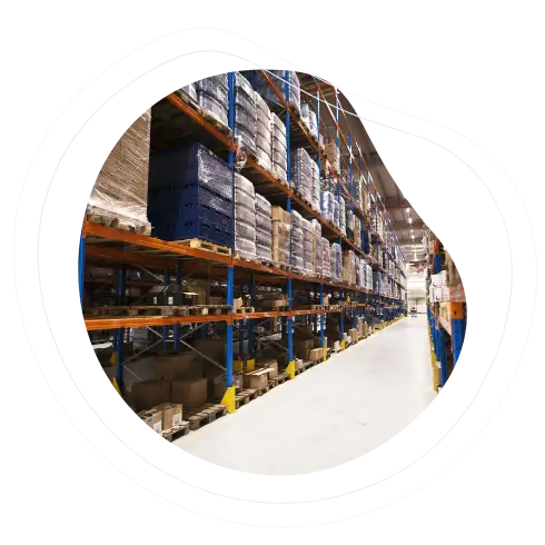 Axion communication consumer services organized warehouse storage with stacked pallets and shelves in a clean, well-lit facility.